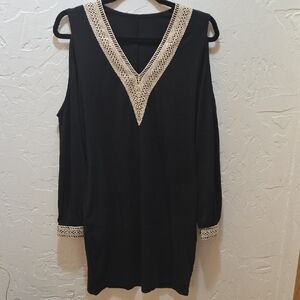 NWOT Elegant Black Cold Shoulder Tunic with Cream Accents